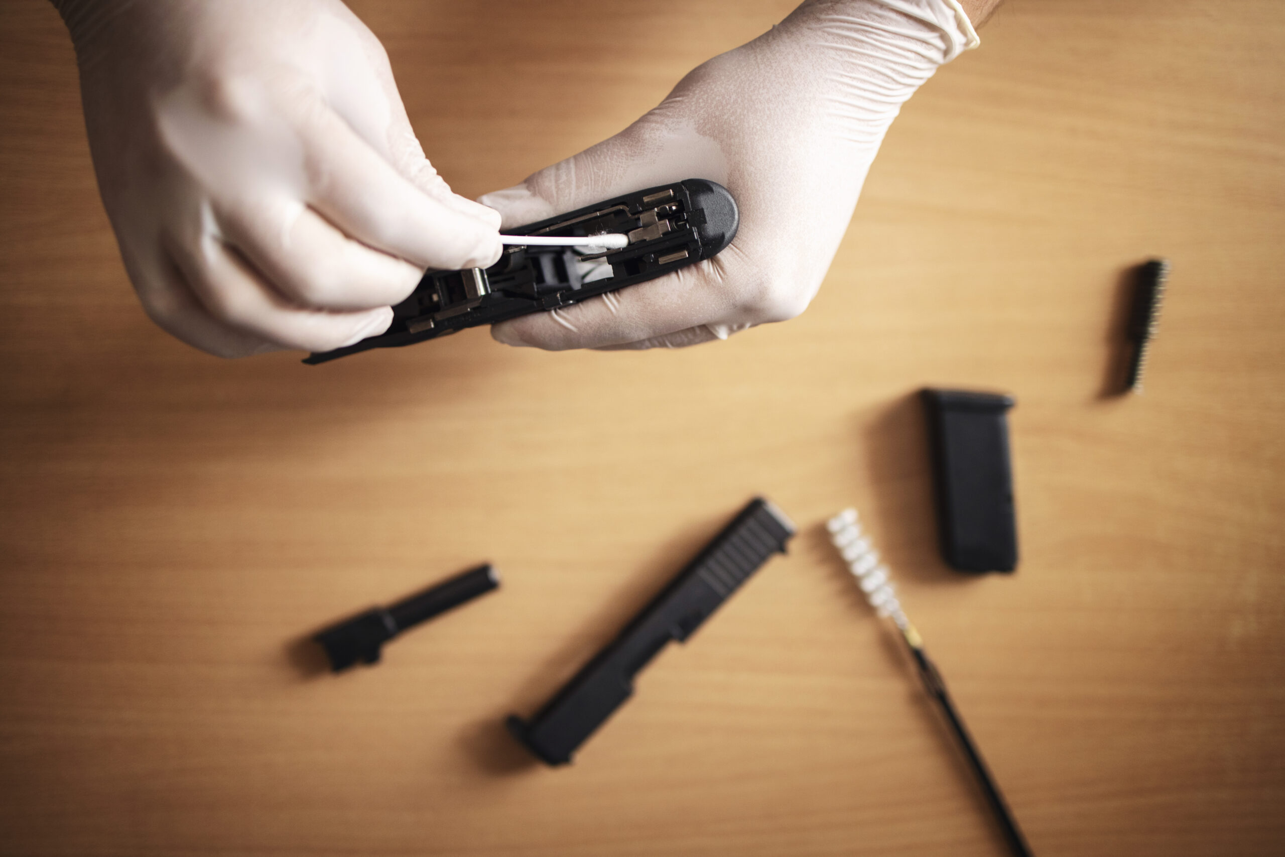 firearm cleaning and maintenance after use at shooting range scaled eduexpert leszno